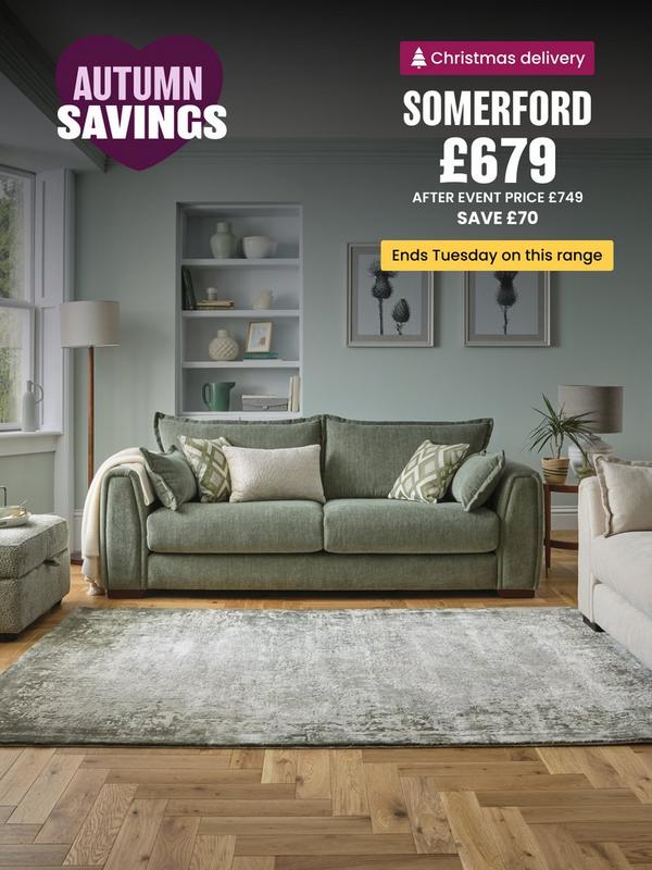 Sage green sofa with complimentary scatter cushions 