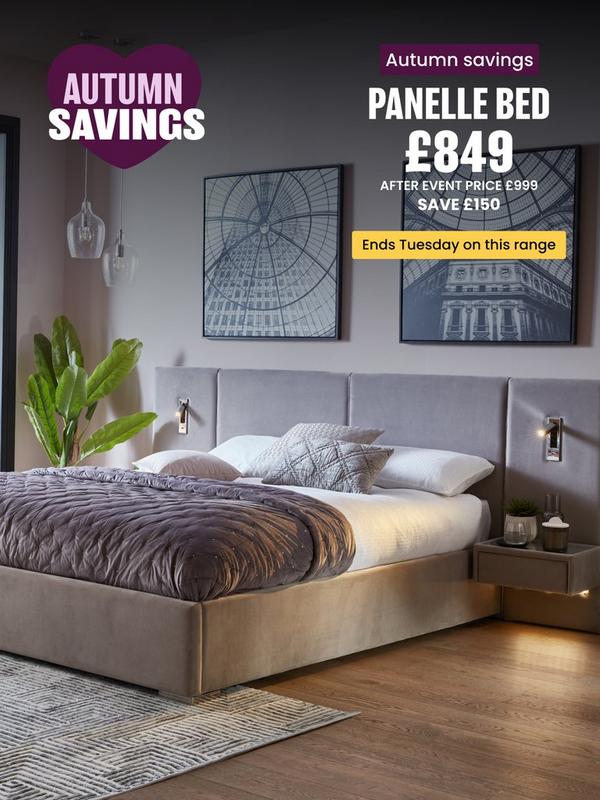 grey hotel style bed with side drawer