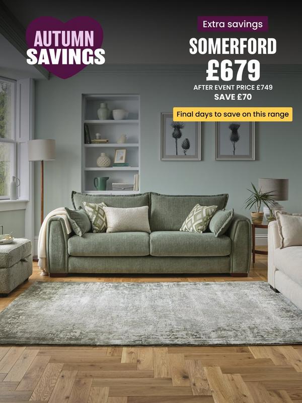 Sage green sofa with complimentary scatter cushions 