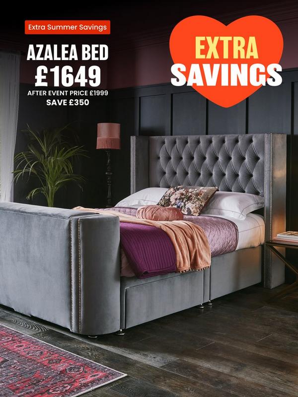 Grey tv bed with button back detail on headboard