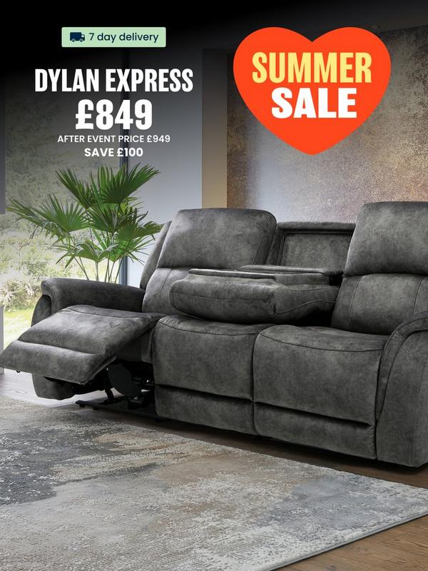 dark grey fabric recliner sofa next to fireplace