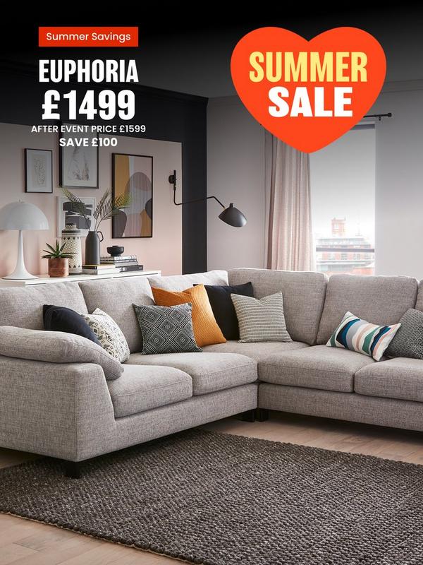 Grey corner sofa with a selection of scatter cushions 