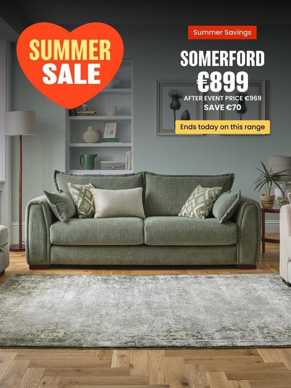 Sage green sofa with complimentary scatter cushions 