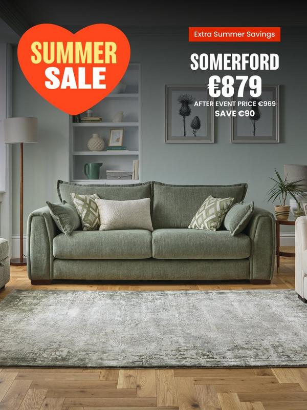 Sage green sofa with complimentary scatter cushions 