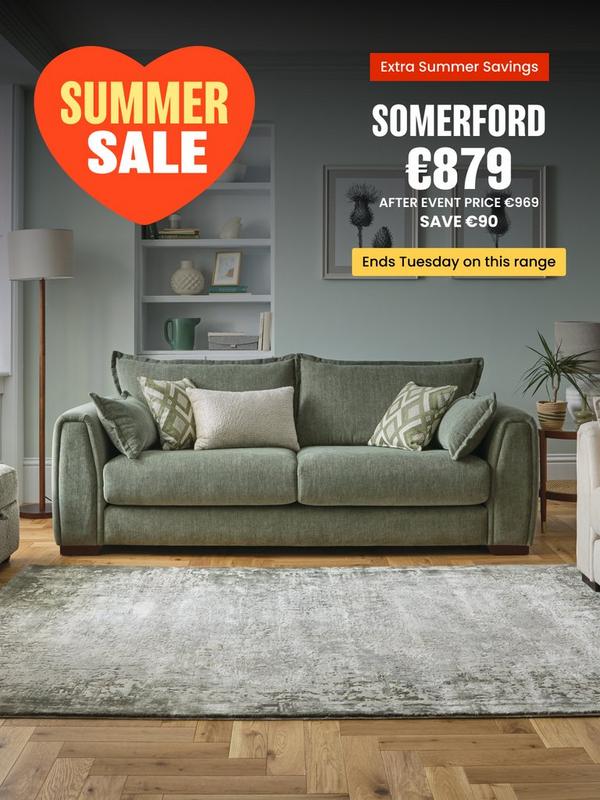 Sage green sofa with complimentary scatter cushions 