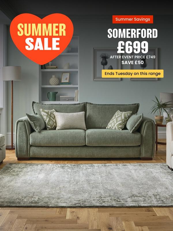 Sage green sofa with complimentary scatter cushions 