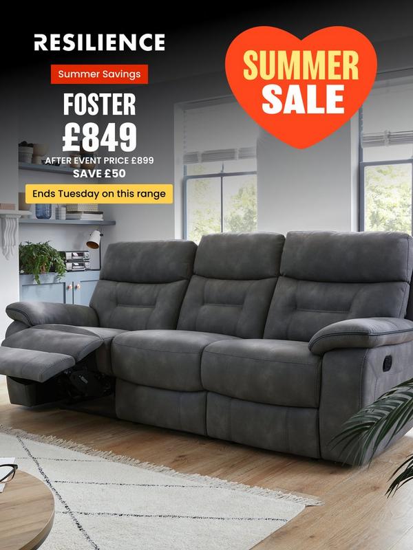 dark grey fabric recliner sofa next to fireplace