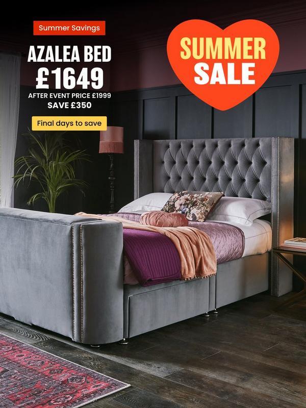 Grey tv bed with button back detail on headboard