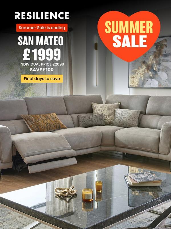 Stone coloured corner sofa with reclining features on footrest with selection of scatter cushions
