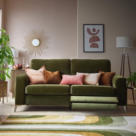 khaki sofa in velvet with pink and nude scatter cushions 