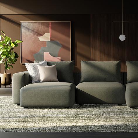 khaki sofa in a dark and moody room with panelled walls