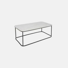white coffee table with black legs
