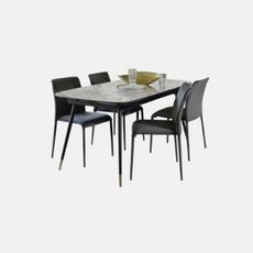 a marble dining table with black legs and four dining chairs