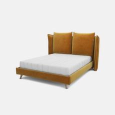 Mustard yellow divan bed with two cushions