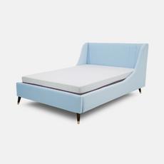 blue divan bed with wooden legs