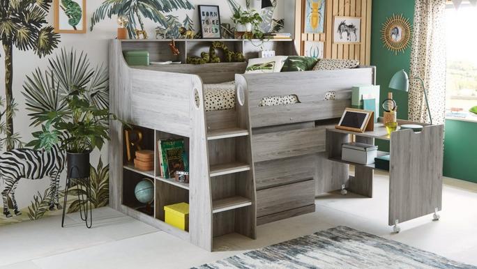 Grey wood effect mid sleeper with shelves, drawers and a pull out desk in a childs bedroom jungle wallpaper