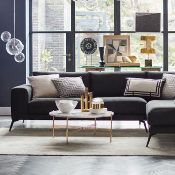 How to style a black sofa