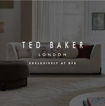 cream curved sofa and a selection of scatter cushions with the ted baker logo on top