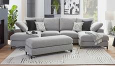 light grey u shaped sofa with footstool in modern lounge