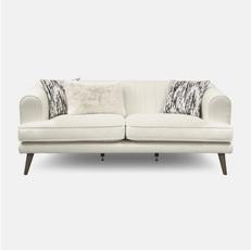 cream sofa with black and white pattern cushions