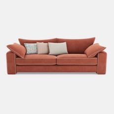 orange sofa with white piping and patterns scatter cushions