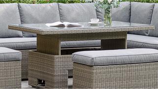 Grey rattan garden sofa set with rising dining table