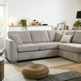 beige corner jumbo cord sofa with wooden feet