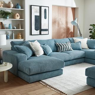 blue double end chaise jumbo cord sofa with blue and white scatter cushions