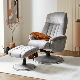 Light grey swivel chair with matching footstool finished with orange throw and sat on a fluffy white rug