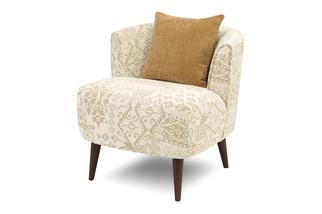 yellow patterned tub chair with black wooden legs and an orange scatter cushion