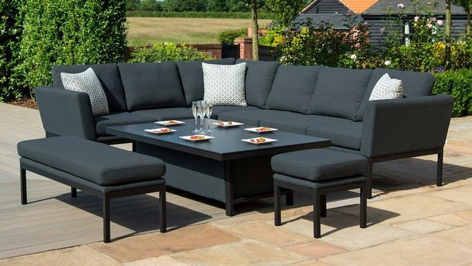 Black corner garden sofa with two matching benches and a table with lift function