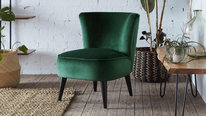 dark green velvet accent chair with black legs