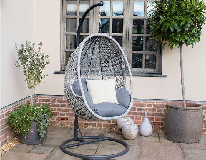 Light grey rattan hanging chair with black base