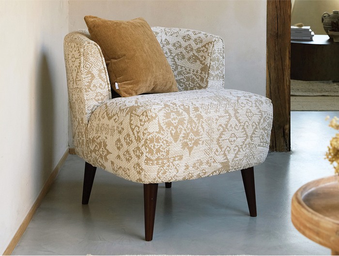 beige patterened tub chair 