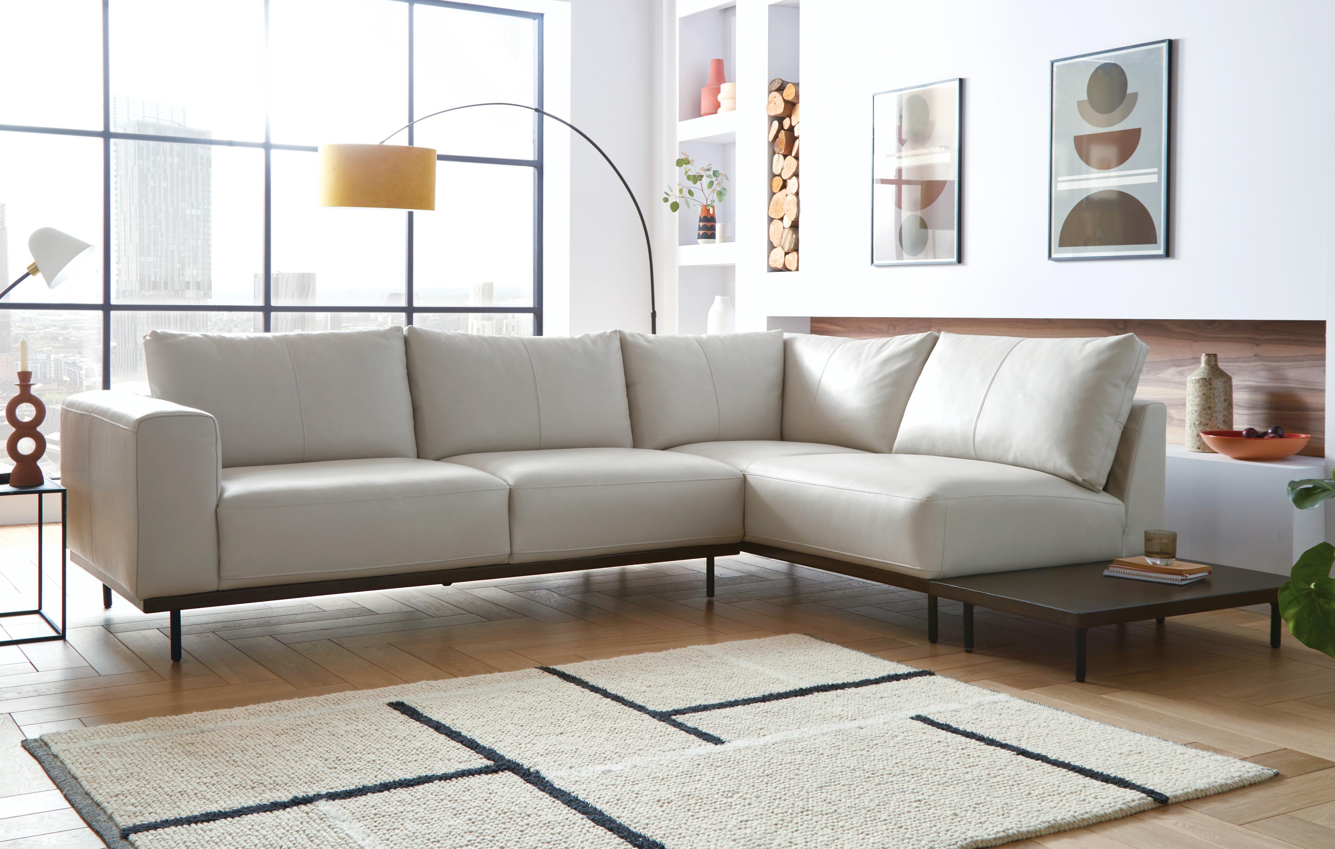 L shaped on sale tan couch