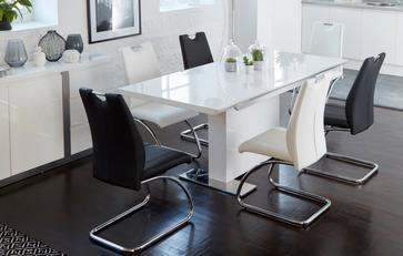 Extending Dining Table & 4 Black Faux Leather Chairs