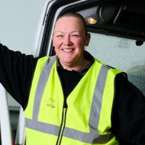 Nicola in high vis vest smiling